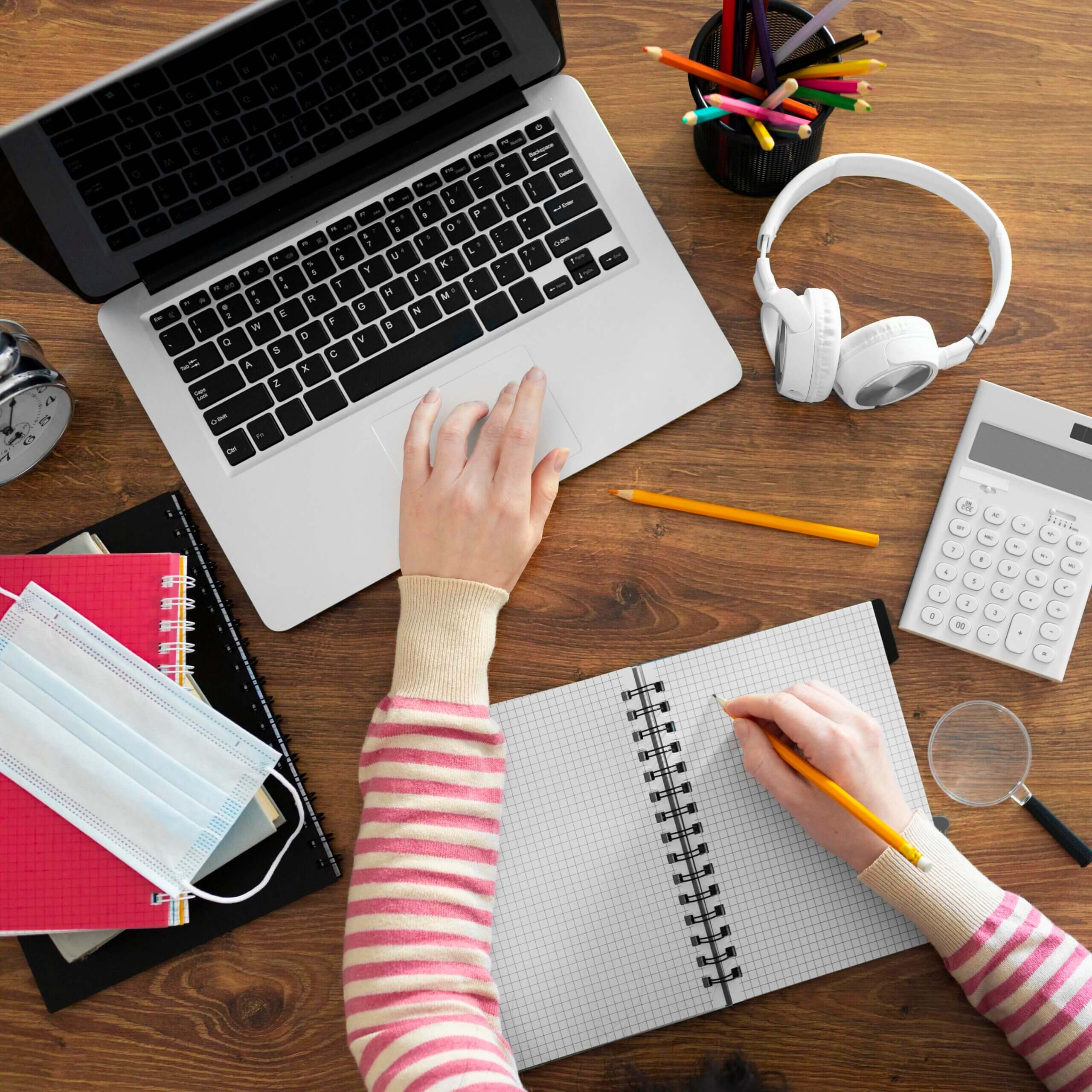 Close Up Hand Taking Notes Edited Scaled